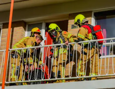 Brand in keuken in flatwoning snel onder controle