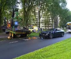 Taxichauffeur gewond bij botsing met graafmachine