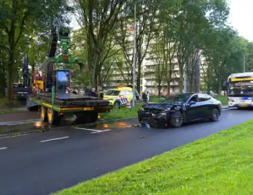 Taxichauffeur gewond bij botsing met graafmachine