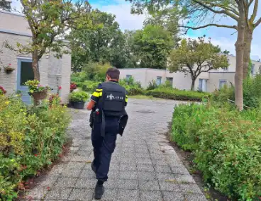 Politie in kogelwerende vesten na melding overval