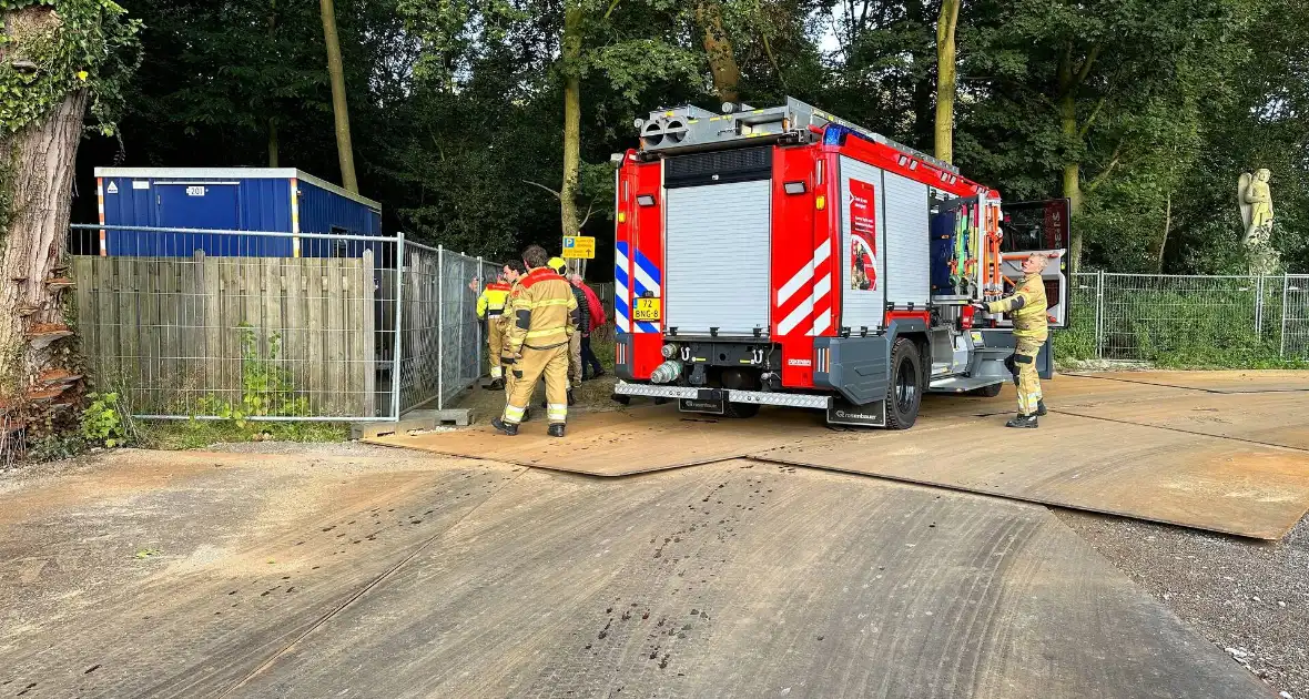 Brandweer bevrijdt fietser die achter gesloten stond - Foto 6