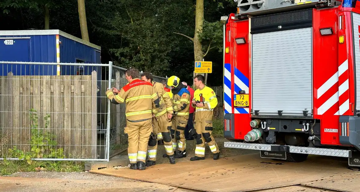 Brandweer bevrijdt fietser die achter gesloten stond - Foto 7