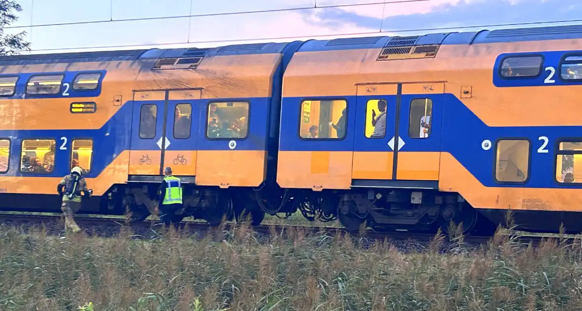 Rookontwikkeling onder trein door vastgelopen remmen - Foto 2