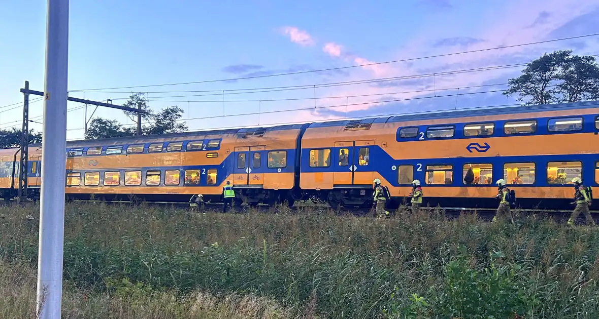 Rookontwikkeling onder trein door vastgelopen remmen - Foto 3