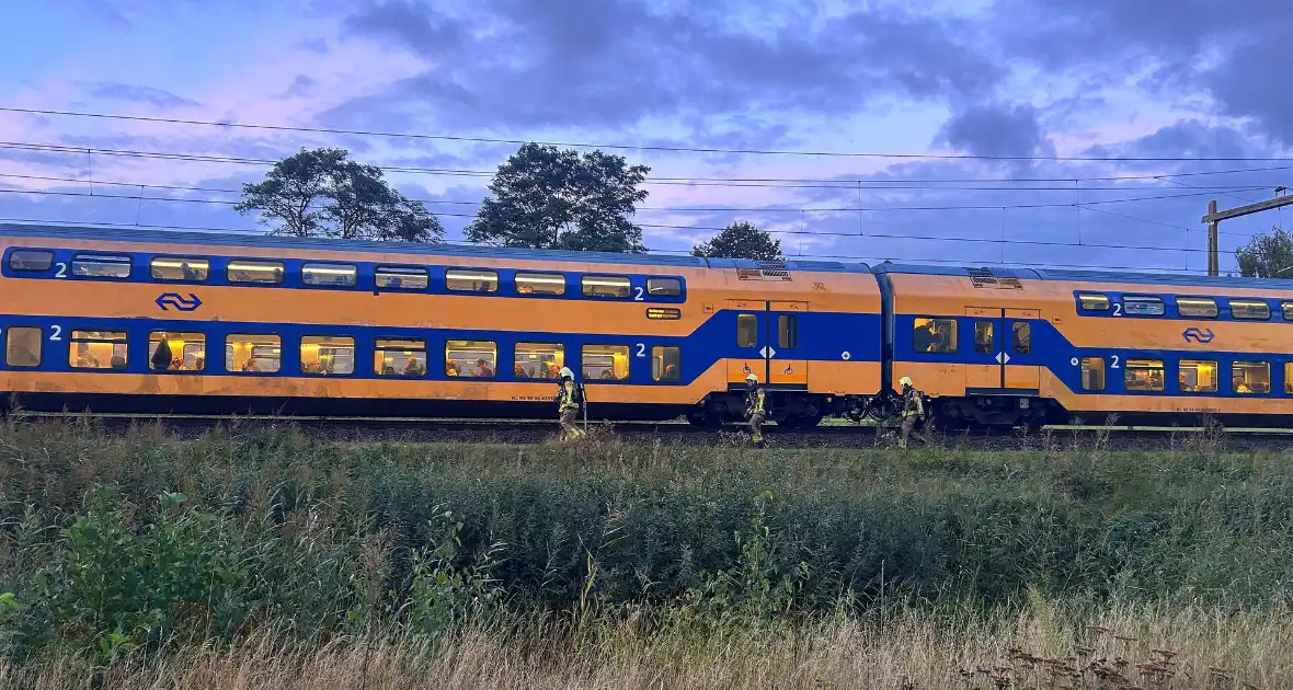 Rookontwikkeling onder trein door vastgelopen remmen - Foto 4