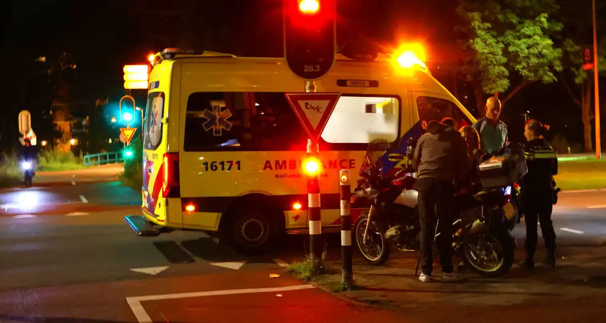 Motorrijder en fietser in botsing bij verkeerslicht - Foto 7