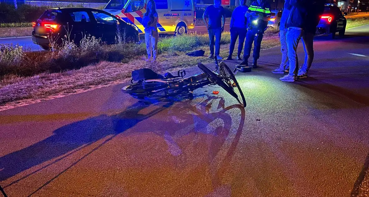 Fietser botst op auto - Foto 5