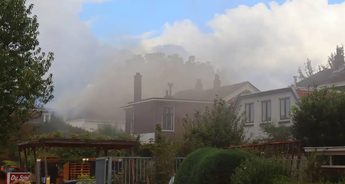 Grote rookontwikkeling bij woningbrand