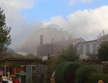 Grote rookontwikkeling bij woningbrand