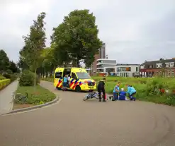 Wielrenner en fietser botsen op elkaar