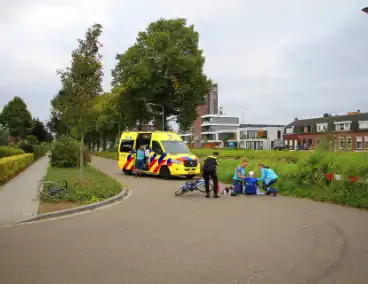 Wielrenner en fietser botsen op elkaar