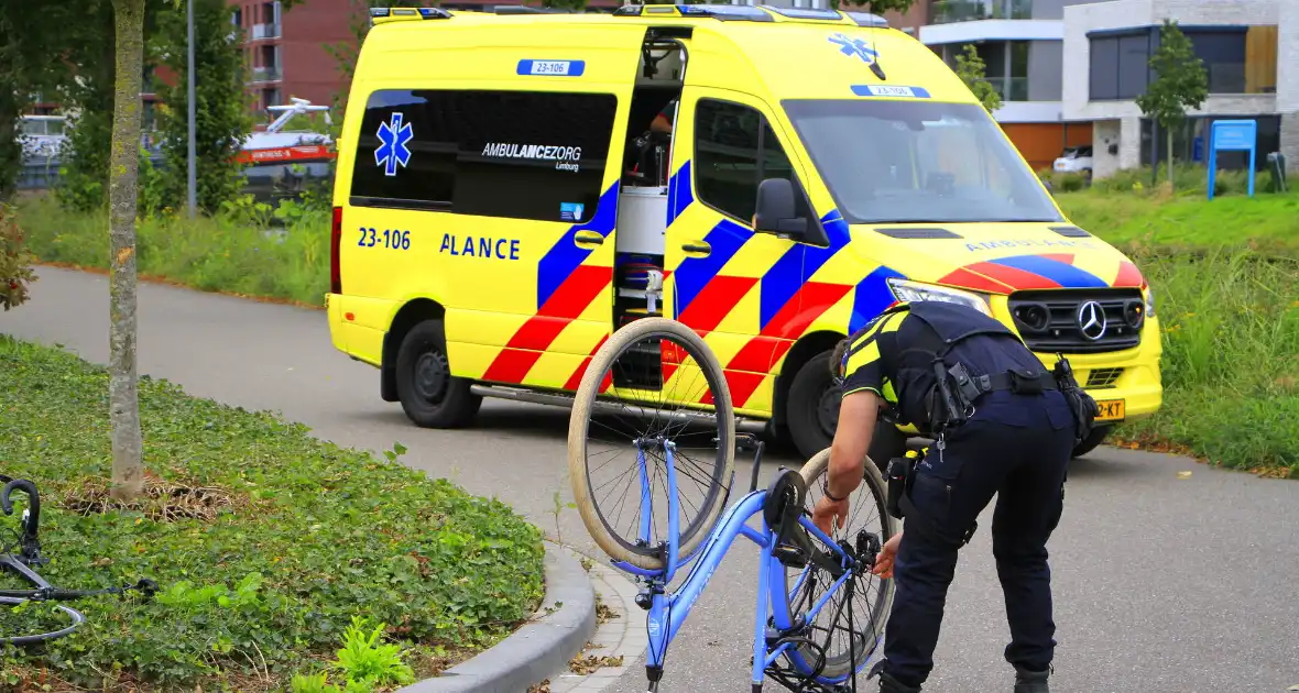 Wielrenner en fietser botsen op elkaar - Foto 1