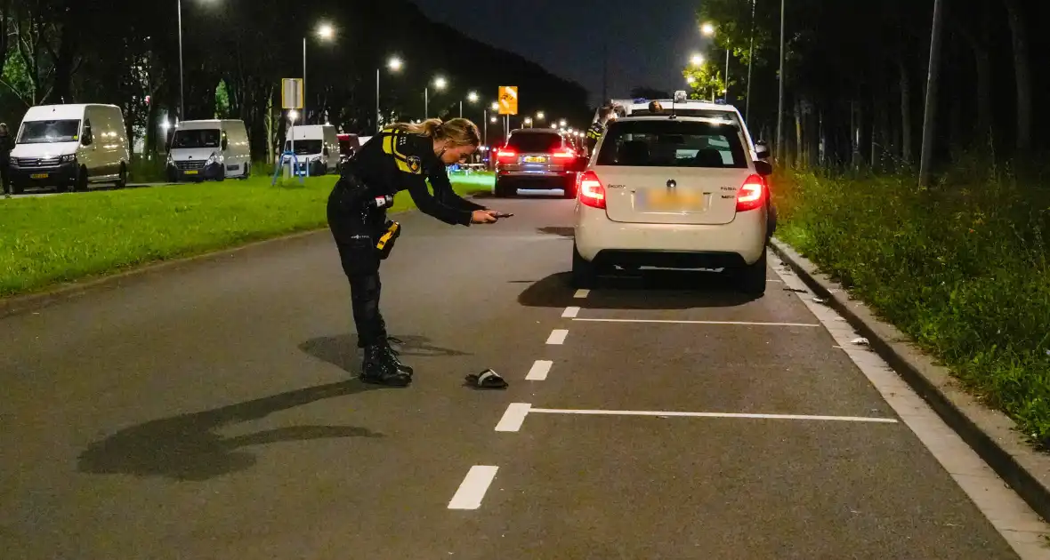 Persoon overvallen die in auto zat