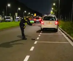 Persoon overvallen die in auto zat