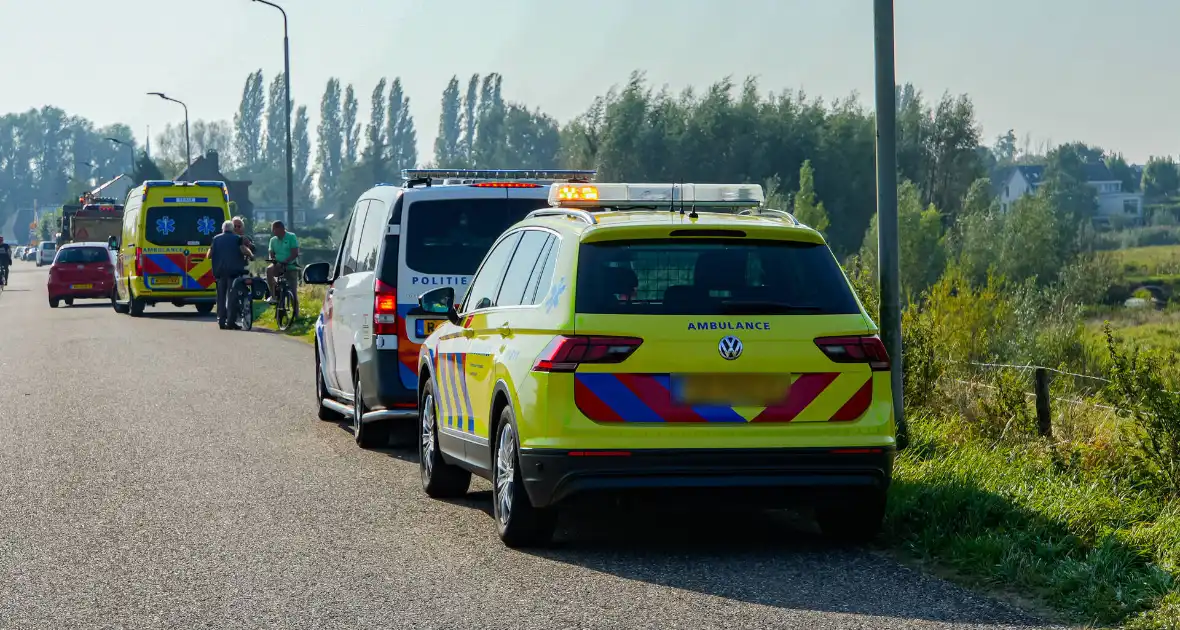 Vergeten handrem eindigt met te watergeraakte auto - Foto 4