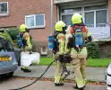 Rookontwikkeling in flat door brandende wc-rollen