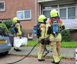 Rookontwikkeling in flat door brandende wc-rollen