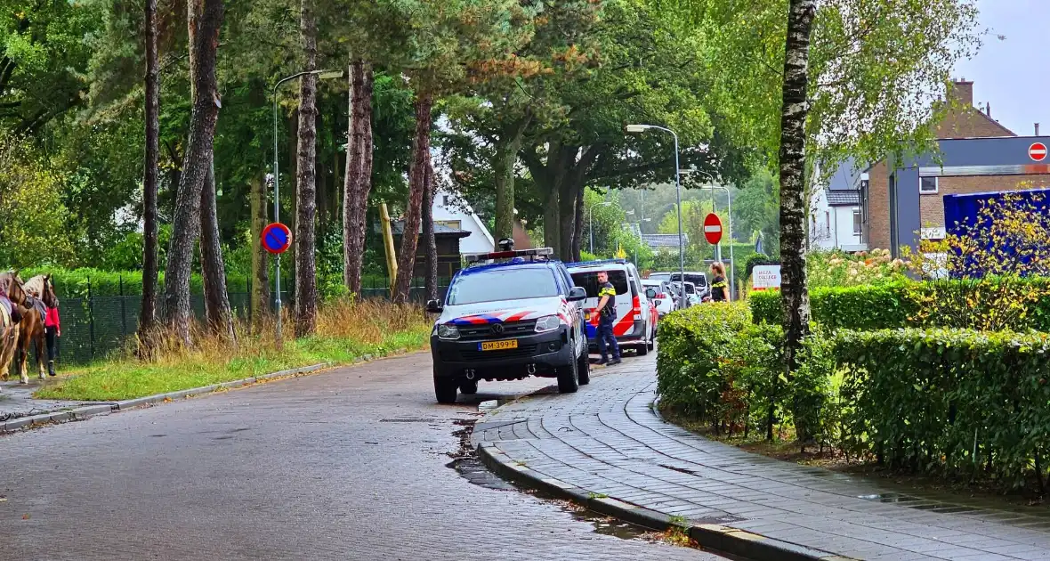 Politie massaal op zoek naar vermiste jongen - Foto 4