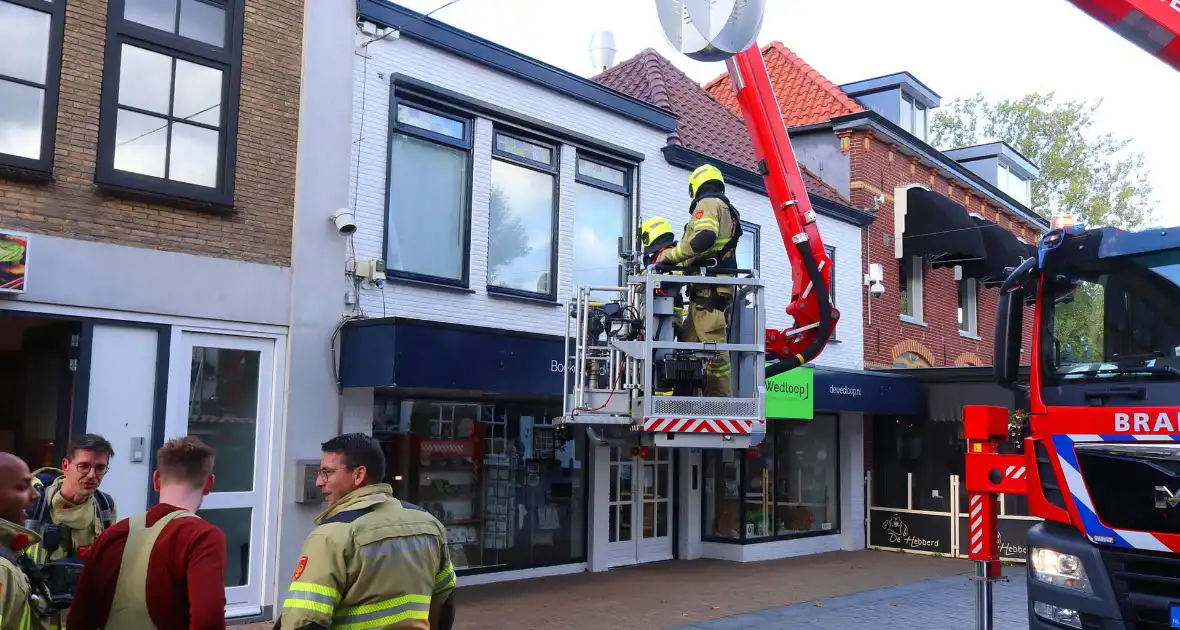 Winkel gecontroleerd na brandmelding in centrum - Foto 10