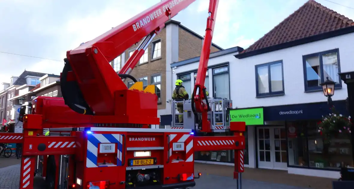 Winkel gecontroleerd na brandmelding in centrum - Foto 4