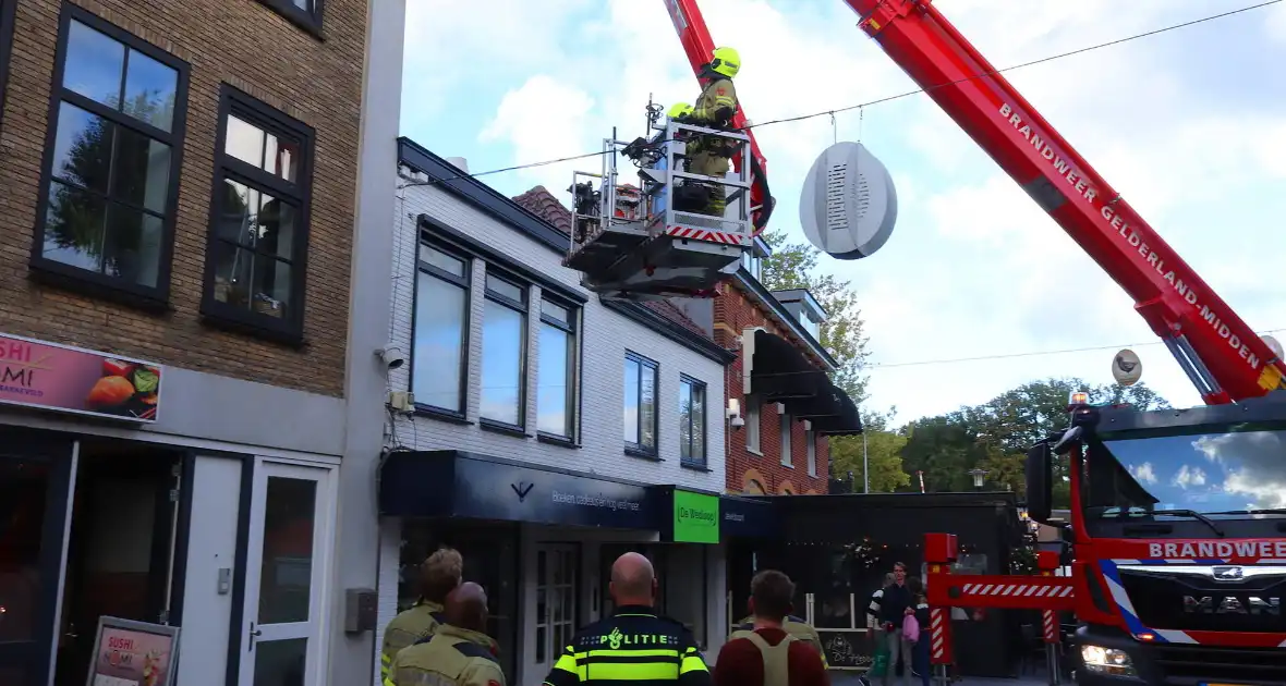 Winkel gecontroleerd na brandmelding in centrum - Foto 8