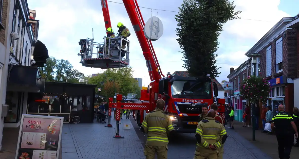 Winkel gecontroleerd na brandmelding in centrum - Foto 9