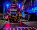 Afvalbrand zorgt voor rookoverlast in woning