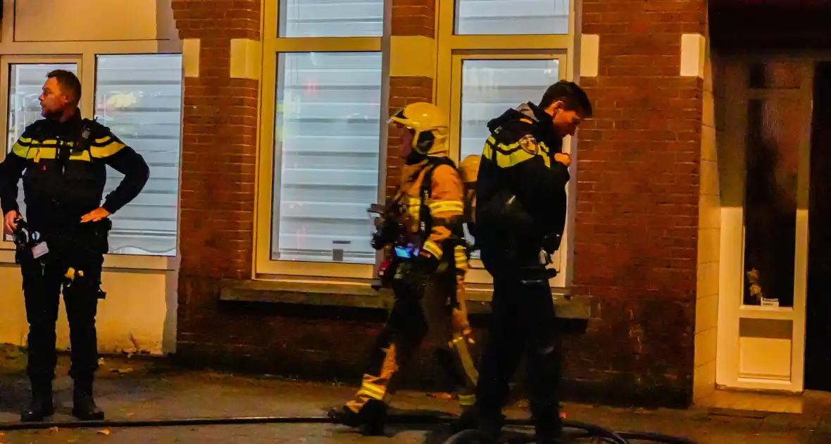 Afvalbrand zorgt voor rookoverlast in woning - Foto 3