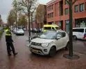 Automobilist botst tegen ondergrondse container