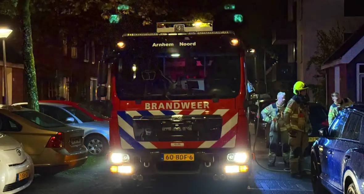 Brandweer blus brand in container