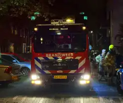 Brandweer blus brand in container