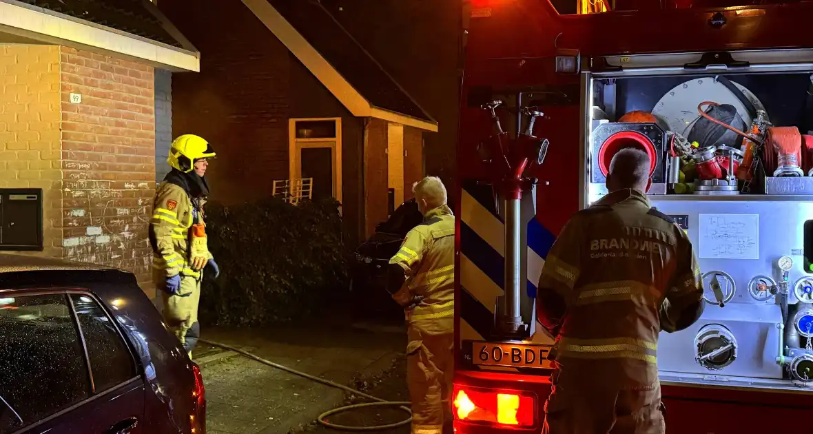 Brandweer blus brand in container - Foto 1