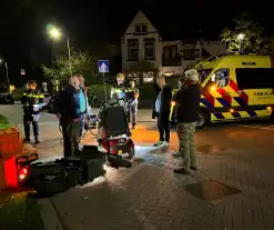 Scootmobieler aangereden door bezorger