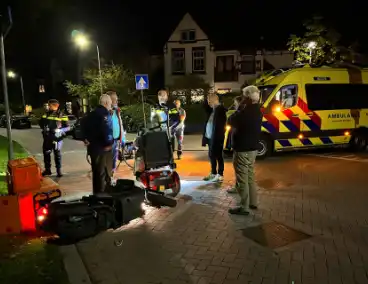 Scootmobieler aangereden door bezorger