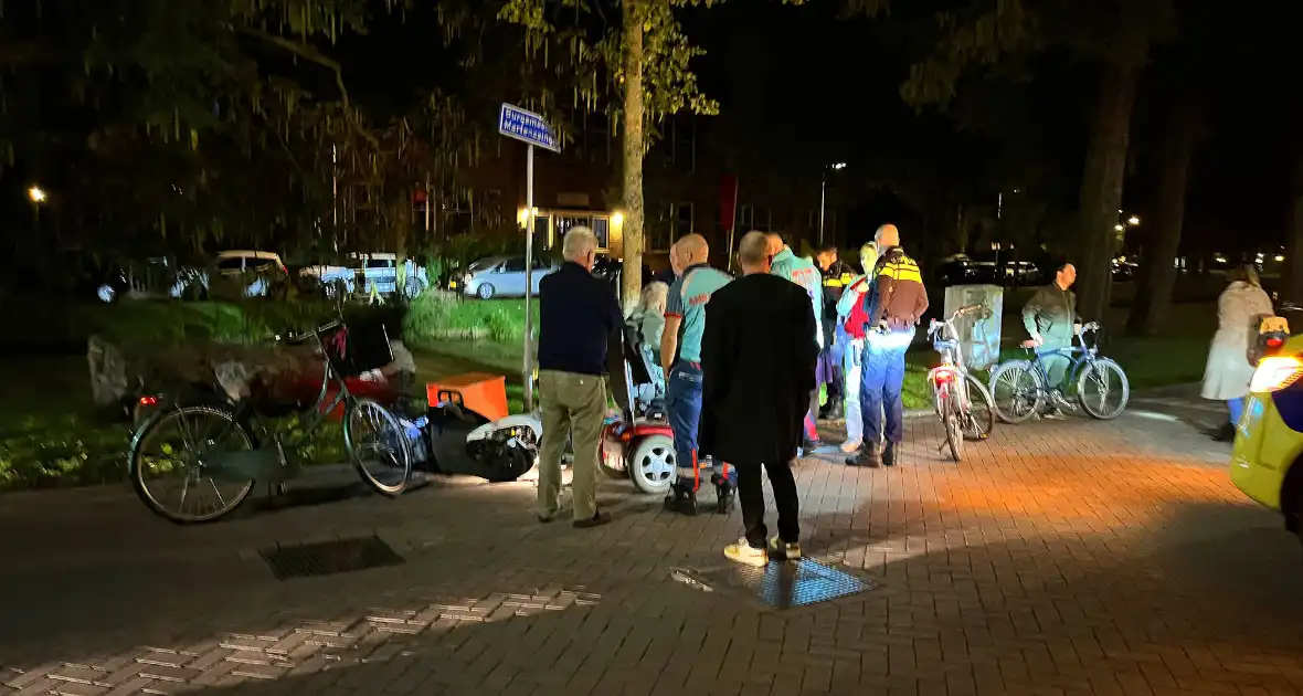 Scootmobieler aangereden door bezorger - Foto 2