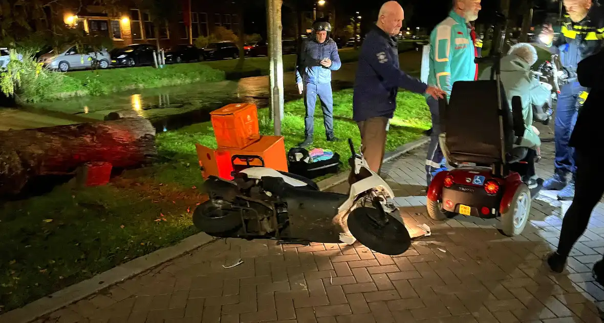 Scootmobieler aangereden door bezorger - Foto 3