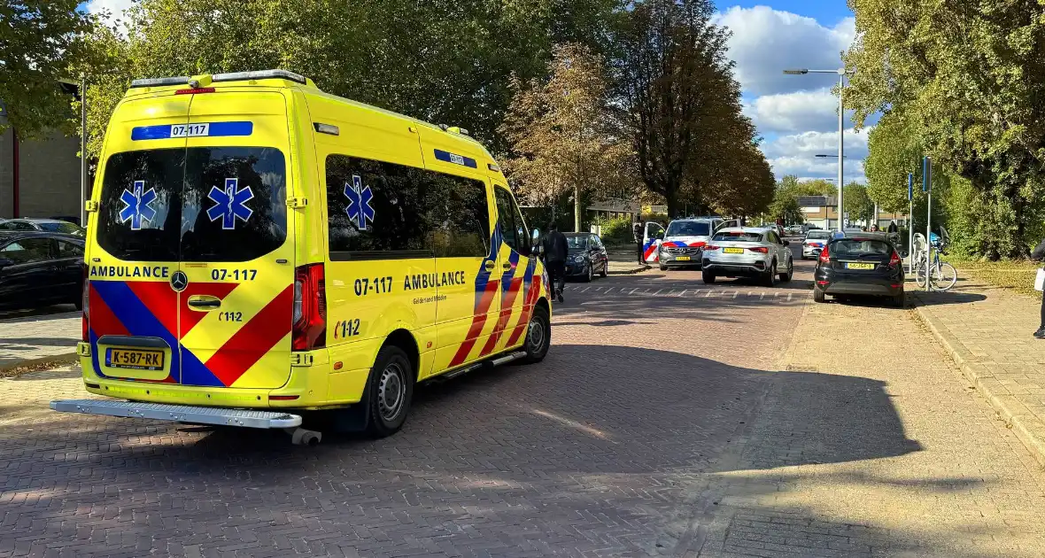 Fietser rijdt tegen openslaand portier - Foto 1