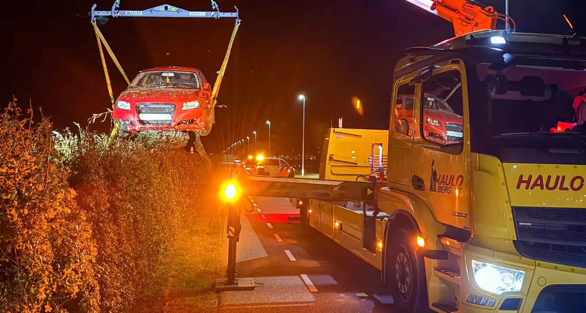 Auto belandt in greppel, inzittenden ongedeerd - Foto 11