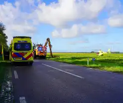 Automobilist komt om bij botsing met tractor