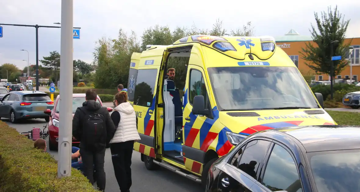 Kind op fiets geschept door automobilist - Foto 3