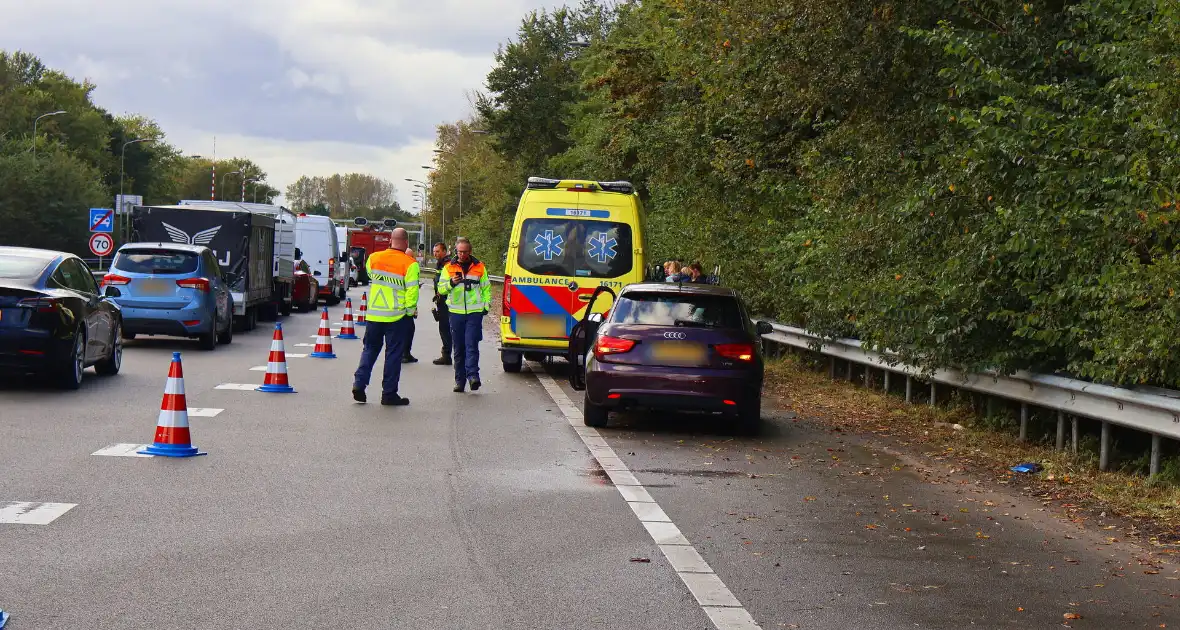 Flinke schade en vertraging na kop-staartaanrijding - Foto 13