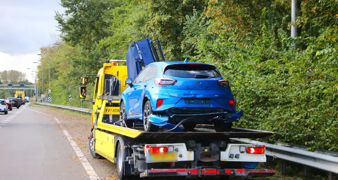 Flinke schade en vertraging na kop-staartaanrijding - Foto 5