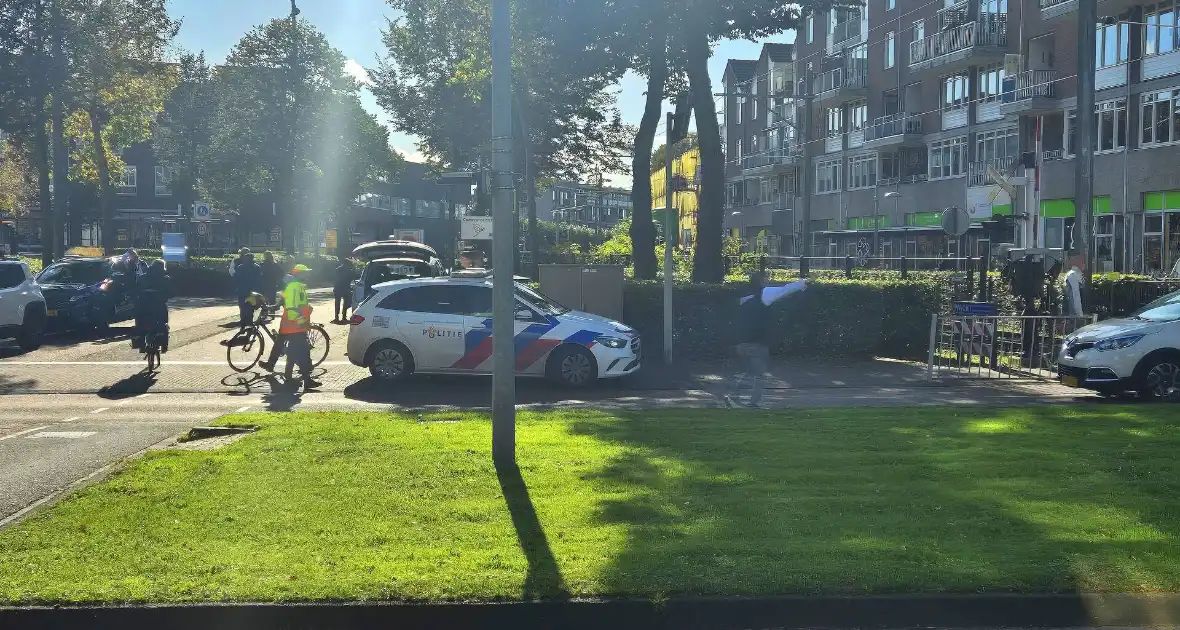 Politie zet verdachte persoon klem tijdens wielerkoers - Foto 1