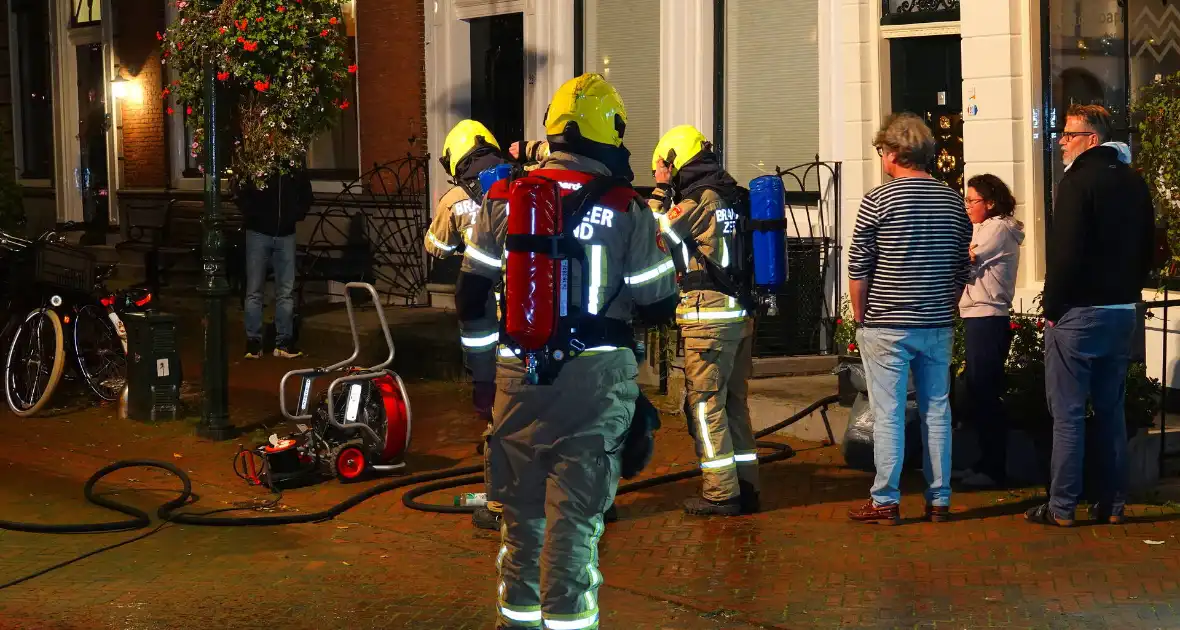 Brand in winkelpand snel onder controle - Foto 10