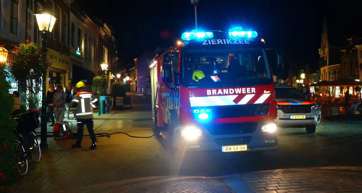 Brand in winkelpand snel onder controle - Foto 9