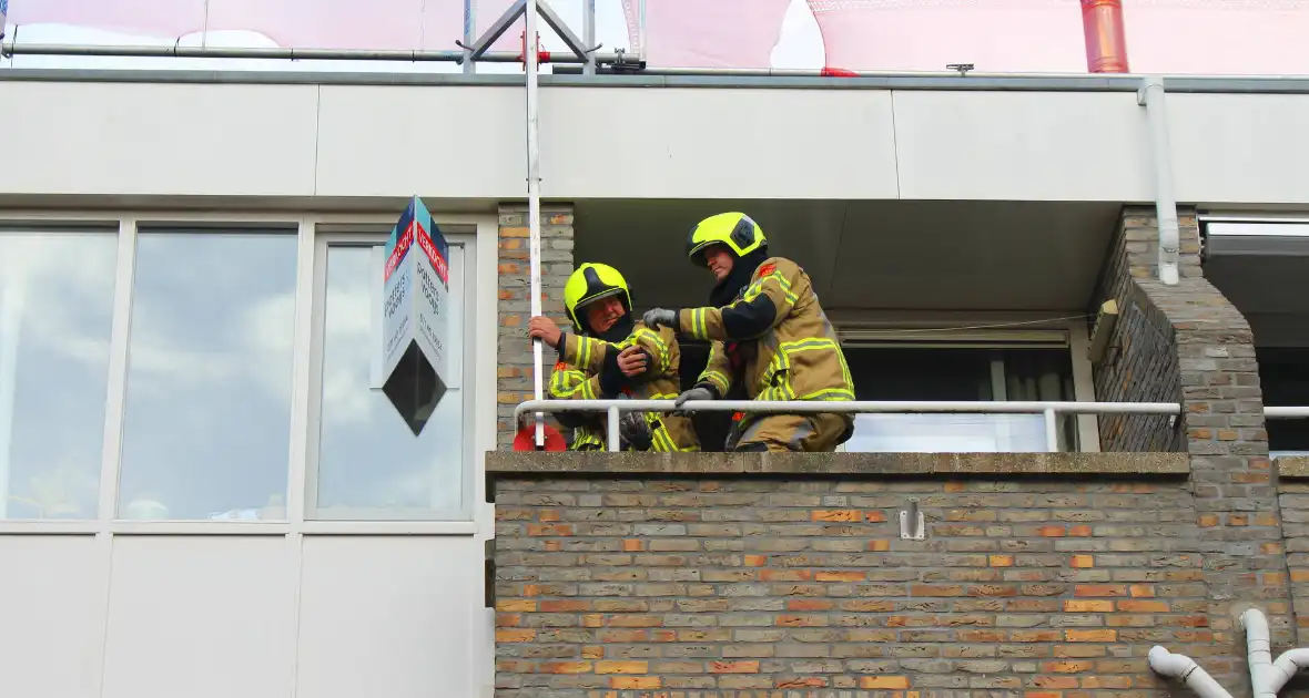 Steigerdeel losgeraakt door harde wind - Foto 6