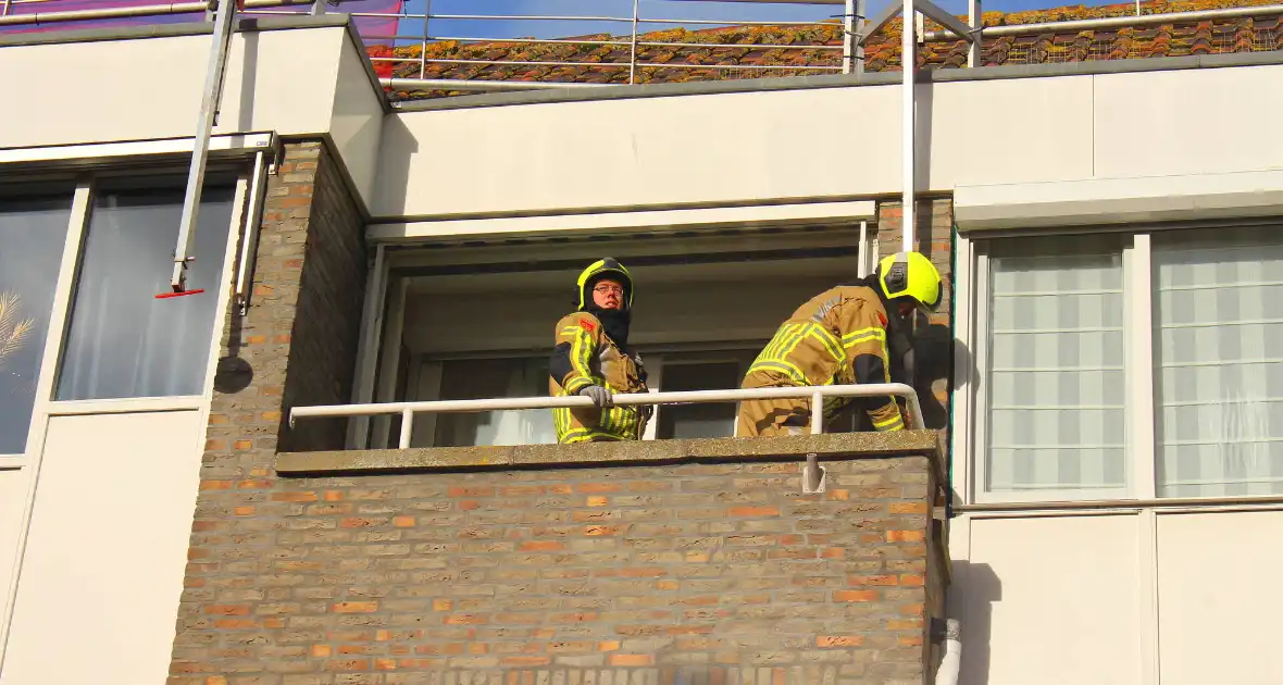 Steigerdeel losgeraakt door harde wind - Foto 9