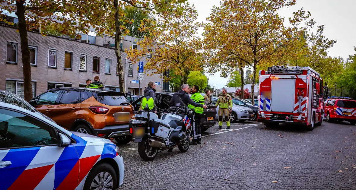 Persoon bekneld in auto - Foto 2