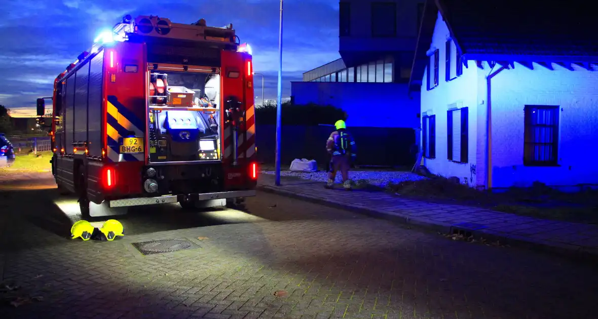 Rook uit kachel aangezien voor mogelijke woningbrand