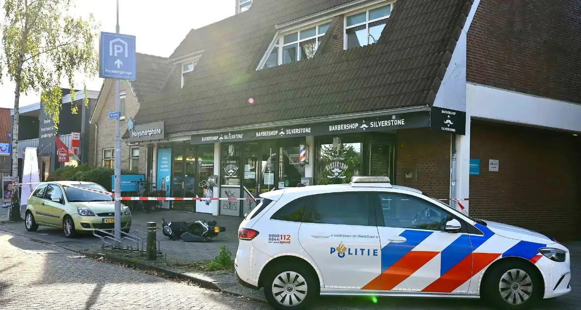 Twee tieners gezocht na overval op telecomwinkel - Foto 4